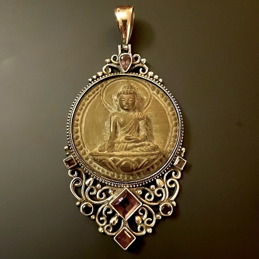 Stone Buddha pendant in Sterling filigree setting with amethyst stones
